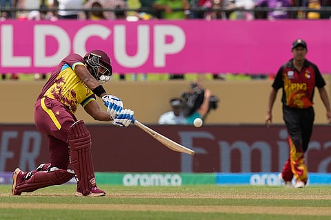 Nicholas Pooran hits a six against PNG